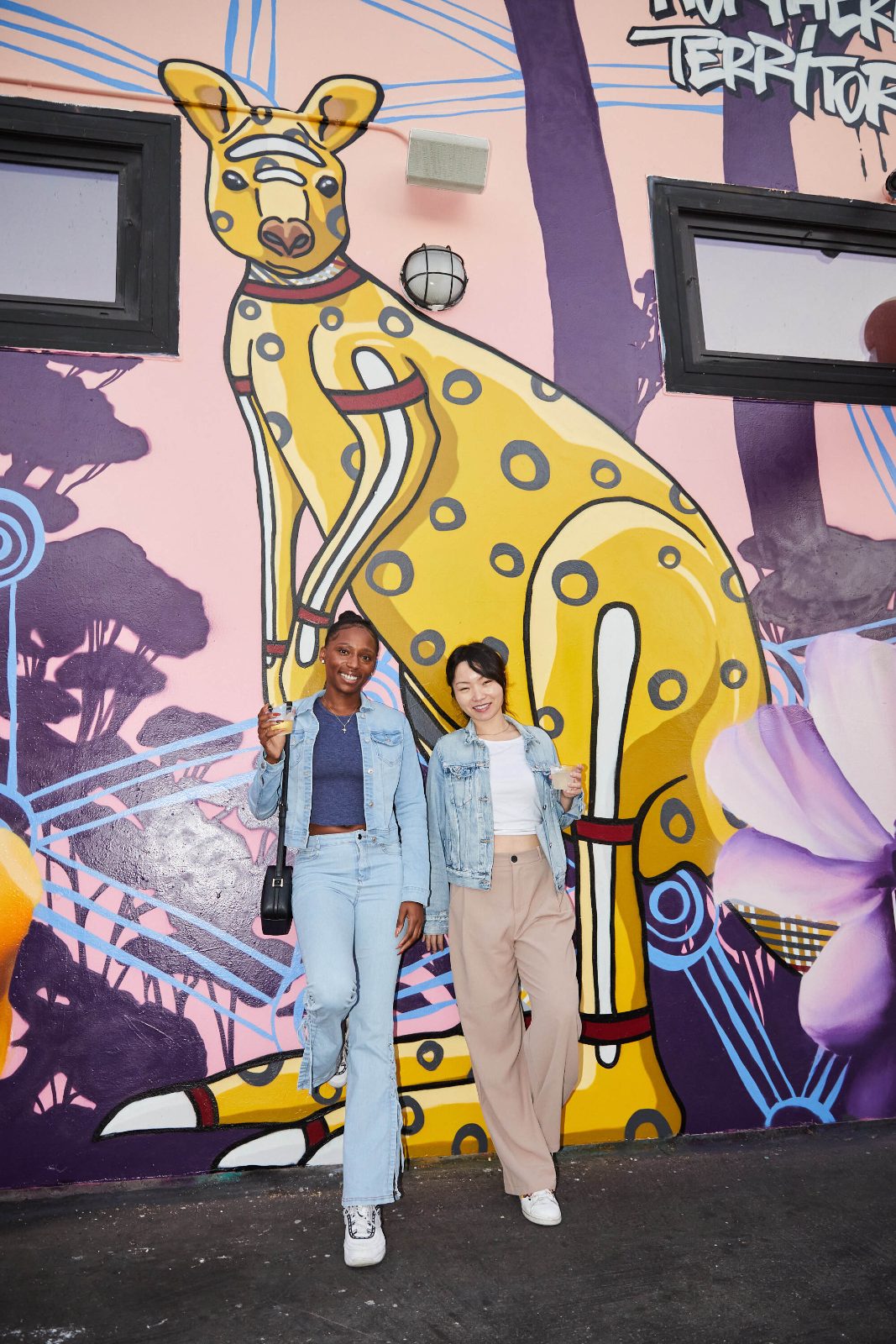 Guests in front of the kangaroo mural